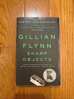 Sharp Objects by Gillian Flynn — Black Cover with Green Text